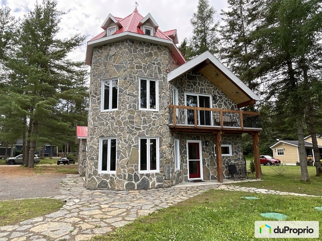 $649,000 - Bungalow for sale in St-Ambroise — photo 1