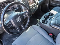 The 2021 Ram 1500 Classic Express 4x4 Crew Cab 57 Box is ready to tackle any road with its striking... (image 8)