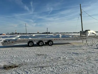 Heavy-duty 37' all-aluminum gooseneck trailer (32'+5' beavertail) designed for maximum payload and s...