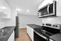 A quiet family-oriented apartment building surrounded by trees and the Gardens, they are spacious, w... (image 3)