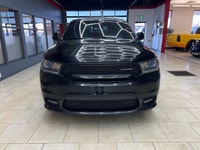 Experience the bold presence and versatility of the 2019 Dodge Durango GT in striking black with an... (image 2)