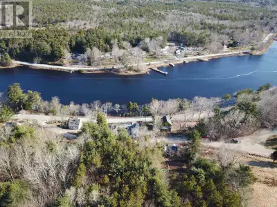 3.13-acre off-grid lot located in Conquerall Bank, Nova Scotia, conveniently situated near Bridgewat...