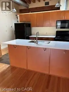 WELCOME TO 20 DICKSON STREET. One of seven, luxury, one bedroom lofts located on the upper level ove...