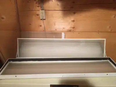 2 Florescent 4' Fixtures drop down door Commercial Model, View more