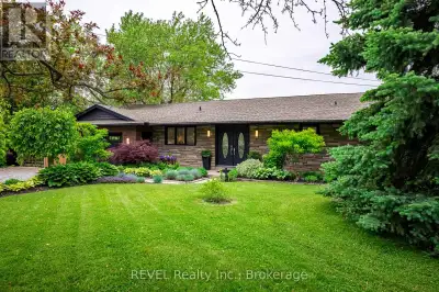 Set against a backdrop of vineyards and open farmland with expansive panoramic views, 238 Queenston...