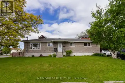 Welcome to this meticulously maintained move in ready 5-bedroom all-brick bungalow offering an attra...
