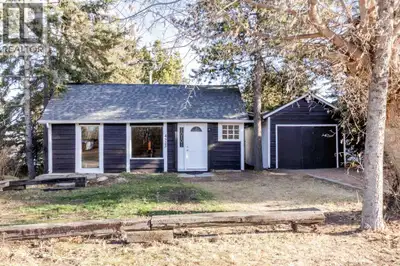 Log cottage in the Palo area of Sylvan Lake on a 50x150 lot. 3 Blocks to the Arena, 4 blocks to the...