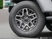 This Jeep Wrangler has a trusty Regular Unleaded V-6 3.6 L/220 engine powering this Automatic transm... (image 6)