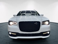 The 2023 Chrysler 300, particularly the 300C RWD in pristine white, is a powerful sedan that truly s... (image 3)