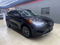 The 2024 Ford Escape in the elegant Black finish coupled with a Front-Wheel Drive system offers an e... (image 9)