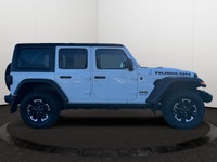 This 2025 JEEP WRANGLER 4-DOOR RUBICON has the following options Cloth Low-Back Bucket Seats, Remote... (image 5)