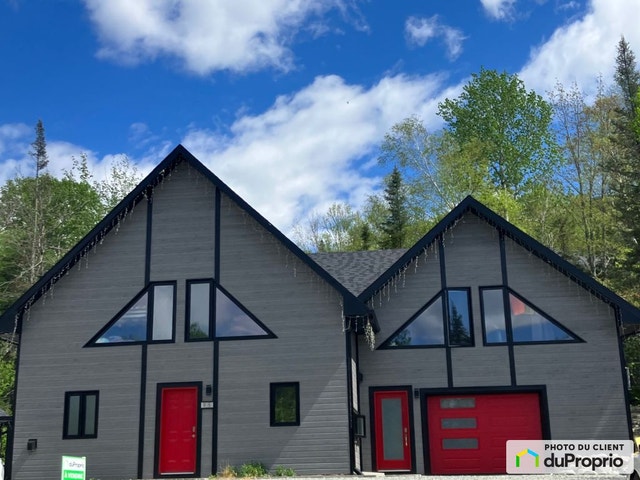 $695,000 - Cottage for sale in L'Anse-St-Jean — photo 1