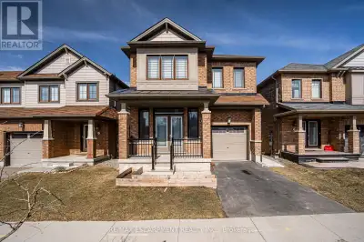 Welcome to 88 Scarletwood Street, a modern 6-bedroom, 4-bathroom detached home built in 2018, offeri...