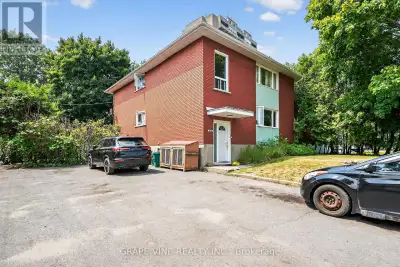 This turnkey investment opportunity presents an income-generating duplex with a bonus unit, perfectl...