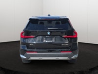 This BMW X1 has a powerful Intercooled Turbo Premium Unleaded I-4 2.0 L/122 engine powering this Aut... (image 4)