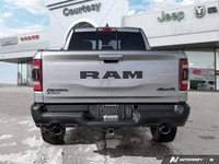 Dominate every road and task in this robust 2021 Ram 1500 Rebel Crew Cab Pickup. Dressed in striking... (image 4)