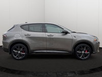 Experience the thrill of the 2024 Dodge Hornet R/T, a plug-in hybrid SUV that effortlessly blends ex... (image 5)