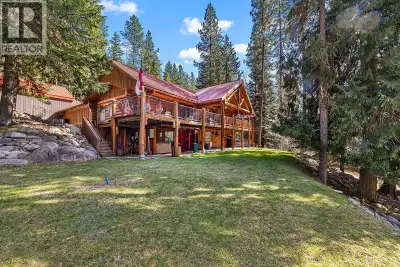 Exquisite Trophy Property: 46.87-Acre Log Estate at 324 Arrow Creek Rd E Nestled on 46.87 secluded a...