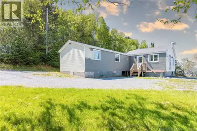 WATERVIEWS AND BEACH JUST STEPS AWAY! Located on a quiet road with amazing Westerly waterviews and M...