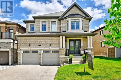 Nestled within an exclusive Aurora enclave, this four-bedroom, four-bath residence pairs refined int...
