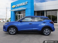 Navigate city streets with confidence and style in the 2022 Nissan Kicks S, striking in Electric Blu... (image 2)