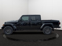 This 2026 JEEP GLADIATOR SPORT 4X4 has the following options Cloth Low-Back Bucket Seats, Uconnect 5... (image 1)