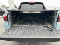 This 2024 Hyundai Santa Cruz Trend boasts a powerful turbocharged engine and stylish Blue Stone exte... (image 6)