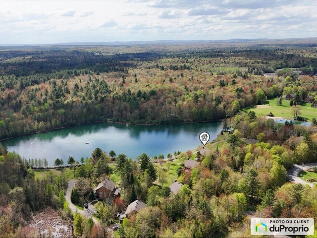 $599,999 - Villa for sale in Lachute — photo 1