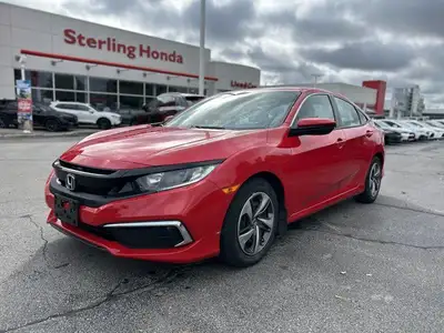 The 2021 Honda Civic Sedan LX in vibrant Rallye Red is your reliable and stylish companion for daily...