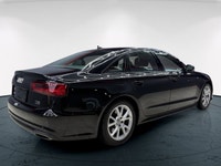 The 2018 Audi A6 Progressiv in stunning black with an AWD drive train offers you a solid and confide... (image 6)