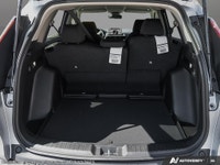The dynamic 2026 Honda CR-V Sport, in its stunning Silver hue and equipped with all-wheel drive, is... (image 6)
