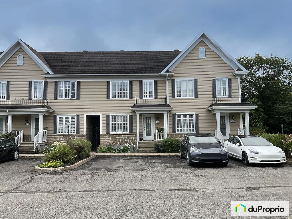 $425,000 - Townhouse for sale in St-Romuald — photo 1