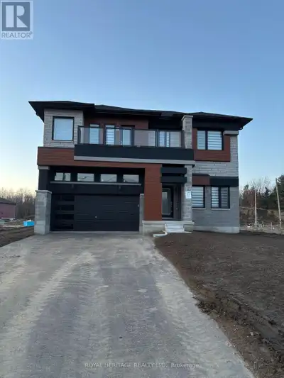 Welcome to this stunning brand-new 3-bedroom home with a main-floor den, ideally located in one of O...