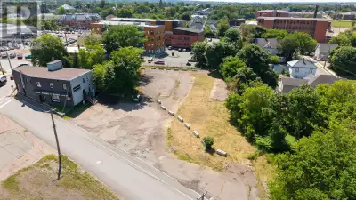 DEVELOPMENT OPPORTUNITIES! This 28,390 q ft lot zoned DC (Downtown Core) has been vacant for some ti...