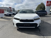 Experience the sleek lines and exhilarating performance of this 2025 Honda Civic Hatchback Hybrid Sp... (image 1)