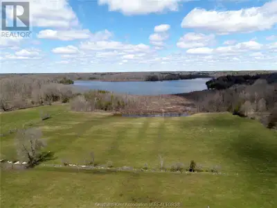 WATERFRONT DEVELOPMENT OPPORTUNITY! Totalling 56 +/- acre, there are 39.96 acres of farmland backing...