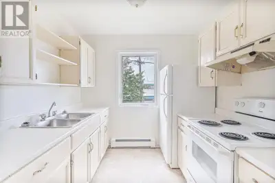 A bright and exceptionally spacious second-floor corner unit offering beautiful water views and an o...