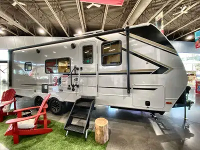 Keystone Cougar Half-Ton travel trailer 22MLSWE highlights: King-Size Bed Theater Seating Booth Dine...
