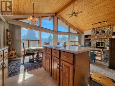 Great views, great layout, and classic cabin vibes! Welcome to 7326 Glacier Drive located on a matur...