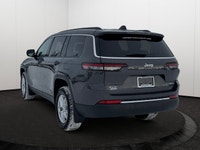 This 2025 JEEP GRAND CHEROKEE L LAREDO 4X4 has the following options Cloth Seats, Power Sunroof, Rem... (image 3)