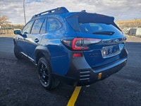 The 2022 Subaru Outback Wilderness in a striking blue finish with an all-wheel-drive system is your... (image 1)
