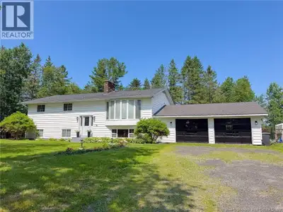 Nestled on a beautifully landscaped lot, this spacious 4-bedroom split entry home offers the perfect...