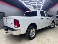 Get ready to own the roads with the stunning 2023 Ram 1500 Classic SLT 4x4 Crew Cab in a pristine wh... (image 8)