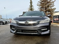 The 2016 Honda Accord Touring CVT Sedan represents the pinnacle of the 9th-generation's mid-cycle re... (image 3)