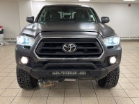 Among midsize pickups that talk tough but feel soft when the work gets real, this 2021 Toyota Tacoma... (image 7)