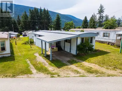 Nestled in the serene and well maintained Greenwood Mobile Home Park, this beautifully renovated 822...