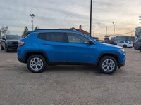 The 2026 Jeep Compass North combines advanced safety, modern technology, and versatile performance i... (image 7)