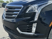 The 2019 Cadillac XT5 Luxury AWD, finished in black with a black leather interior, offers a refined... (image 2)