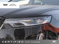 The 2025 Cadillac XT6 AWD Sport, dressed in a sophisticated Stellar Black Metallic exterior and a lu... (image 5)