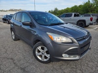 Experience the perfect blend of versatility and efficiency with the 2014 Ford Escape SE, designed fo... (image 2)